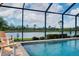 Screened in pool with a view of the lake at 13730 Vancanza, Venice, FL 34293