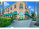 Attractive storefront featuring awnings and outdoor seating, perfect for a cafe or small business at 13730 Vancanza, Venice, FL 34293