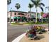 Charming town center featuring colorful flowers, inviting storefronts, and pedestrian-friendly streets at 13730 Vancanza, Venice, FL 34293