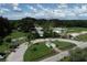 An aerial view of Warm Mineral Springs Park with several buildings and circular fountain at 1449 Overhead St, North Port, FL 34288