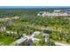 A home in a secluded, woodsy area at 1449 Overhead St, North Port, FL 34288