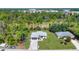 A home in a secluded, woodsy area at 1449 Overhead St, North Port, FL 34288