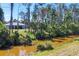 Waterfront property on canal, red kayak visible at 1449 Overhead St, North Port, FL 34288