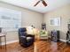 Inviting living area with hardwood floors, comfortable seating, and a mini-bar at 1545 Maseno Dr, Venice, FL 34292