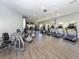 Well-equipped gym with modern treadmills, elliptical machines, weight-lifting machines, and ample workout space at 1572 Jasper Ct, Venice, FL 34292