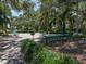 Community park featuring picnic tables, benches, and grill at 1572 Jasper Ct, Venice, FL 34292