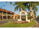 Welcome to Historic Downtown Venice sign with colorful flowers and mature palm trees at 1572 Jasper Ct, Venice, FL 34292