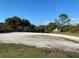 Gravel parking near a community boat ramp, offering easy access to the water at 1596 Landfall Dr, Nokomis, FL 34275