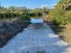 Community boat ramp access, with dock and waterfront views at 1596 Landfall Dr, Nokomis, FL 34275