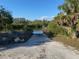 Community boat ramp with easy water access and gravel parking at 1596 Landfall Dr, Nokomis, FL 34275