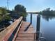 Community dock with waterfront views at 1596 Landfall Dr, Nokomis, FL 34275