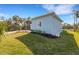 The exterior boasts fresh landscaping and a well-maintained lawn, enhancing the curb appeal at 1596 Landfall Dr, Nokomis, FL 34275