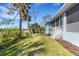 The exterior is enhanced by a well-maintained lawn and a screened lanai, perfect for relaxation at 1596 Landfall Dr, Nokomis, FL 34275