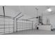 Spacious garage with two car doors and plenty of room for parking and storage at 1596 Landfall Dr, Nokomis, FL 34275