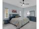 Spacious bedroom with light-colored walls, a ceiling fan, and bright natural light at 1596 Landfall Dr, Nokomis, FL 34275