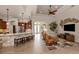 Elegant living room featuring tile floors, modern decor, and a stylish ceiling fan at 190 Montelluna Dr # North, North Venice, FL 34275