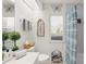 Clean bathroom featuring a shower with a patterned curtain, a vanity with a decorative mirror, and a window at 1904 Canary Island St, Venice, FL 34292