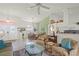 Open-concept living room with seamless transition to dining area and kitchen at 1904 Canary Island St, Venice, FL 34292