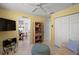 Bright living room area that opens to a breakfast nook, a large closet, and a tiled floor at 1904 Canary Island St, Venice, FL 34292