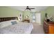 Cozy main bedroom with a large closet, carpet flooring, and a bright, airy feel at 1904 Canary Island St, Venice, FL 34292