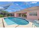 Enjoy this beautiful screened-in pool with sunny skies, offering a perfect oasis for relaxation and outdoor enjoyment at 1904 Canary Island St, Venice, FL 34292