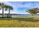 Breathtaking lakefront property with manicured lawn at 19249 Isadora St, Venice, FL 34293