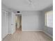 Spacious bedroom featuring modern ceiling fan, new wood-look floors, and a ceiling fan at 200 The Esplanade N # B10, Venice, FL 34285