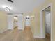 Open floorplan living room featuring wood floors and neutral-colored walls at 200 The Esplanade N # B10, Venice, FL 34285