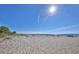 Wide sandy beach offers ample space for relaxation and recreation under the bright sunshine at 26825 Weiskopf Dr, Englewood, FL 34223