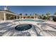 Resort-style community pool with multiple cabanas, hot tub, and ample seating for residents and guests at 26825 Weiskopf Dr, Englewood, FL 34223