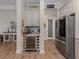 Convenient butler's pantry featuring a wine fridge, cabinetry, and stainless steel refrigerator at 26825 Weiskopf Dr, Englewood, FL 34223