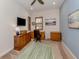Dedicated office space featuring built-in cabinetry and ample natural light at 26825 Weiskopf Dr, Englewood, FL 34223