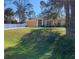 Charming single-story home with a well-maintained lawn and a beautiful garden in a lovely neighborhood at 2863 Twinkle Ave, North Port, FL 34286