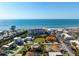 Two-story home with roof deck enjoys close proximity to the beach, offering relaxed coastal lifestyle at 397 Flamingo Dr, Venice, FL 34285