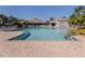 Large community pool features ample deck space and lounge chairs with nearby clubhouse at 4238 Mackay Falls Ter, Sarasota, FL 34243