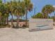 Welcome to Siesta Beach, a Sarasota County Park, featuring tennis courts and lush palm trees at 4238 Mackay Falls Ter, Sarasota, FL 34243