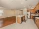 Spacious kitchen with breakfast bar overlooking the living area and stainless steel appliances at 4238 Mackay Falls Ter, Sarasota, FL 34243