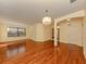 Living room with open space, beautiful floors and view to other living areas at 4238 Mackay Falls Ter, Sarasota, FL 34243