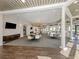 Neutral meeting room featuring tables, chairs, hard floors, and neutral colors at 4238 Mackay Falls Ter, Sarasota, FL 34243