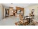 This living room features wood accents, an open floor plan, and an eat-in kitchen at 424 Shade Ter, Venice, FL 34293