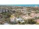 A scenic aerial view of a neighborhood with single-Gathering homes near the ocean at 432 Palmetto Ct, Venice, FL 34285