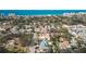 A beautiful neighborhood sits near the ocean in this sunny aerial view at 432 Palmetto Ct, Venice, FL 34285