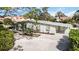 Charming single-story home with light green siding and a well-manicured front yard at 432 Palmetto Ct, Venice, FL 34285