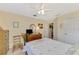 Bedroom featuring a bed, ceiling fan, dresser, and a closet at 4332 Big Leaf St, North Port, FL 34286