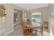 Cozy dining area with warm lighting and classic wooden furniture at 4332 Big Leaf St, North Port, FL 34286