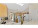 Bright kitchen featuring white appliances and plenty of counter space at 4332 Big Leaf St, North Port, FL 34286