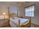 Cozy bedroom showcasing a double bed, decorative lighting and a ceiling fan for a relaxing atmosphere at 4425 Corso Venetia Blvd # A20, Venice, FL 34293