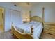 Well-lit bedroom with a large double bed, bedside tables and a spacious closet, ideal for comfort at 4425 Corso Venetia Blvd # A20, Venice, FL 34293