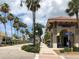 Charming street view featuring local shops and restaurants, beautiful palm trees, and well maintained sidewalks at 4425 Corso Venetia Blvd # A20, Venice, FL 34293