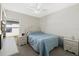 Cozy bedroom with neutral tones, a ceiling fan, and plenty of natural light at 5194 Layton Dr, Venice, FL 34293